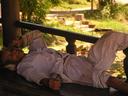 The old, wooden bridge seems to be the local hang out spot for elderly men.